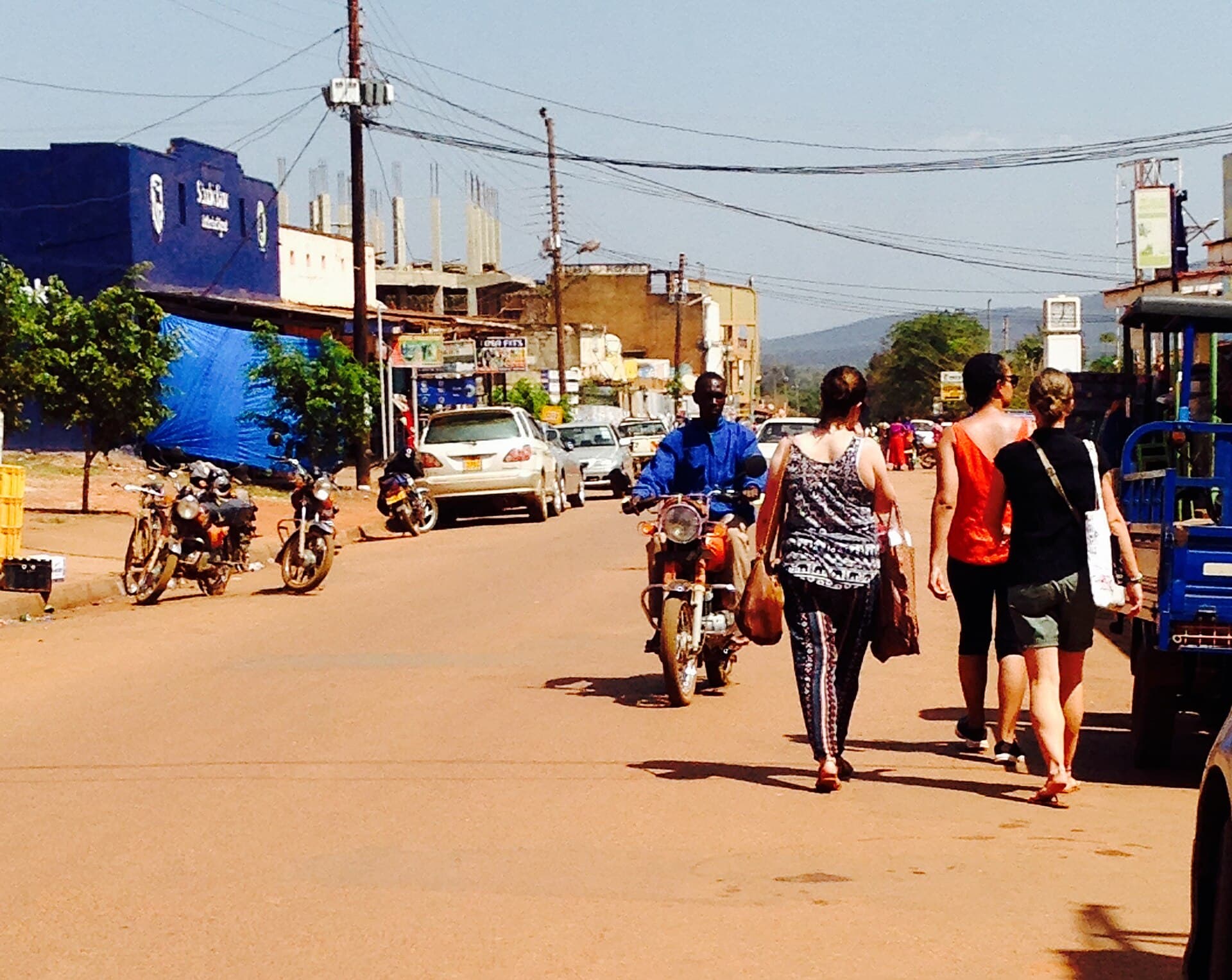 A street scene in Masindi town with a boda boda